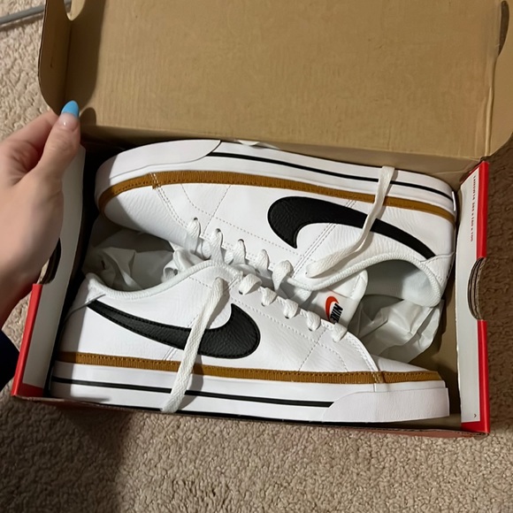 Nike White and Black Sneakers with Gold Accents - Picture 1 of 4
